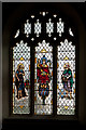 A stained glass window on the south side of The Church of St Peter, Fremington