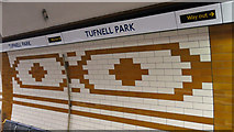 TQ2985 : Tufnell Park tube station - ceramic tiles (2) by Mike Quinn