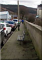 Metal bench above the Rhondda River, Treorchy