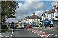 TQ5287 : Shops on A124 Hornchurch Road by Robin Webster