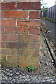 Benchmark on Blandford Court garage block