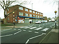 Zebra crossing and shops, Upper Town Street, Bramley