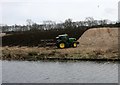 Ploughing beside the canal