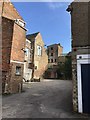 TF4509 : Rear courtyard of Old Market properties in Wisbech by Richard Humphrey