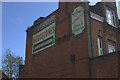 Ghost signs in Meredith Mews