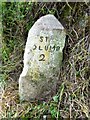 SW8961 : Old Milestone south of Trebudannon by Rosy Hanns