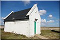 TM4448 : Orford Ness lighthouse: former oil store by Christopher Hilton