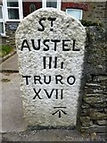 SX0653 : Old Milestone by the A390, St Blazey Gate by Rosy Hanns