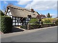 Thatched timber-framed cottage