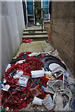TQ1375 : Discarded wreaths from Hounslow War Memorial by Ian S