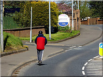 H4772 : Man on scooter along Hospital Road, Campsie by Kenneth  Allen