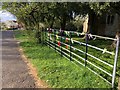 Ribbons of hope on the church fence