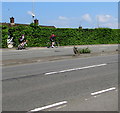 Two cyclists ascending Malpas Hill, Newport