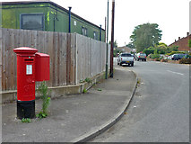 TQ1266 : Postbox, corner of Homefield Road and Fieldcommon Lane by Robin Webster