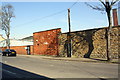 SE2423 : Walls on southeast side of Warwick Road by Roger Templeman