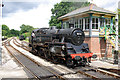 80151 runs round its train at Kingscote