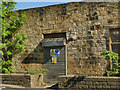 Old trade sign at Stonebridge Mills