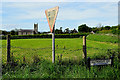 H6057 : Give way sign along Ballynasaggart Road by Kenneth  Allen