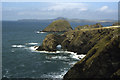 SM8433 : Natural arch on coast west of Abercastle as seen from Pen Castell-coch by Colin Park