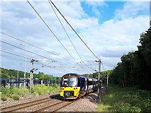 SE2436 : Bradford train approaching Kirkstall Forge station by Stephen Craven