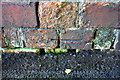 Benchmark on wall pier at NE end of Coundon Street