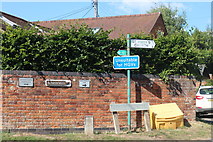 SP7722 : Numerous signs on Church Street, North Marston by David Howard
