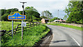 Sign with minor road entering Low Lands