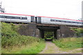 Train heading towards Tamworth Station on Bridge UB77 LEC2