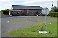 Damaged road sign along Church Road, Laragh