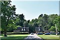 Brettenham: Two mid c19th lodges at the entrance to Old Buckenham Hall School