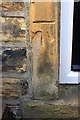 Benchmark on left hand door jamb of #50 Prospect Road