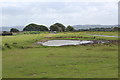 Pond near road junction on ridge