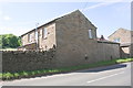 Bingy Cottage on south side of A684