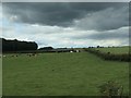 SE8947 : Dark clouds over Londesborough Wold by Christine Johnstone