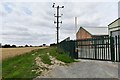 Stradbroke: Skinners Animal Feeds and Pet Food factory and cereal crop next to it