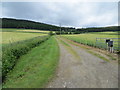 Track between arable fields leading to Bluefold