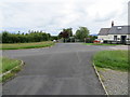 Junction of roads and houses at Carleton Hill, Cocklakes