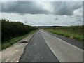 Nine Dikes Road heading south to the B1253