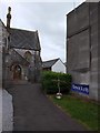 Cross and poster outside St Margaret