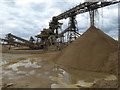 TQ7175 : Sand piling up at Brett Aggregate Works by Marathon