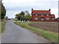 Car park and a house called 