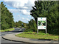SE3127 : Sign for New Forest Village by Stephen Craven