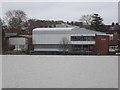 Swan Theatre across a flooded Worcester Racecourse