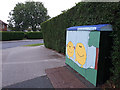 Utility cabinet with smiley faces