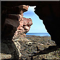 NU0054 : Red sandstone cliffs at Magdalene Fields by Walter Baxter