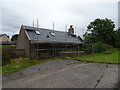 Cottage under repair beside the A90