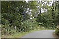 Sharp corner on unclassified road near Cantray House