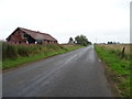 Farm building and minor road, Nether Kinmundy