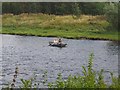 A Fisherman in a Boat on the River Tweed