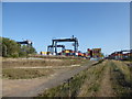 TM2535 : Cranes and containers at the railhead, Felixstowe Docks by Chris Holifield